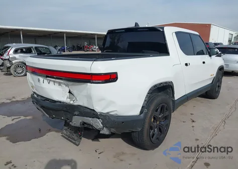 2023 Rivian R1T Adventure Quad Motor Large Pack from USA, damaged, VIN 7FCTGAAA9PN021331